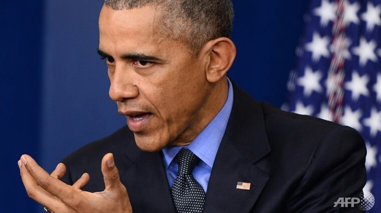 奥巴马美国史上第一个黑人总统!可谓是美国的一个传奇!